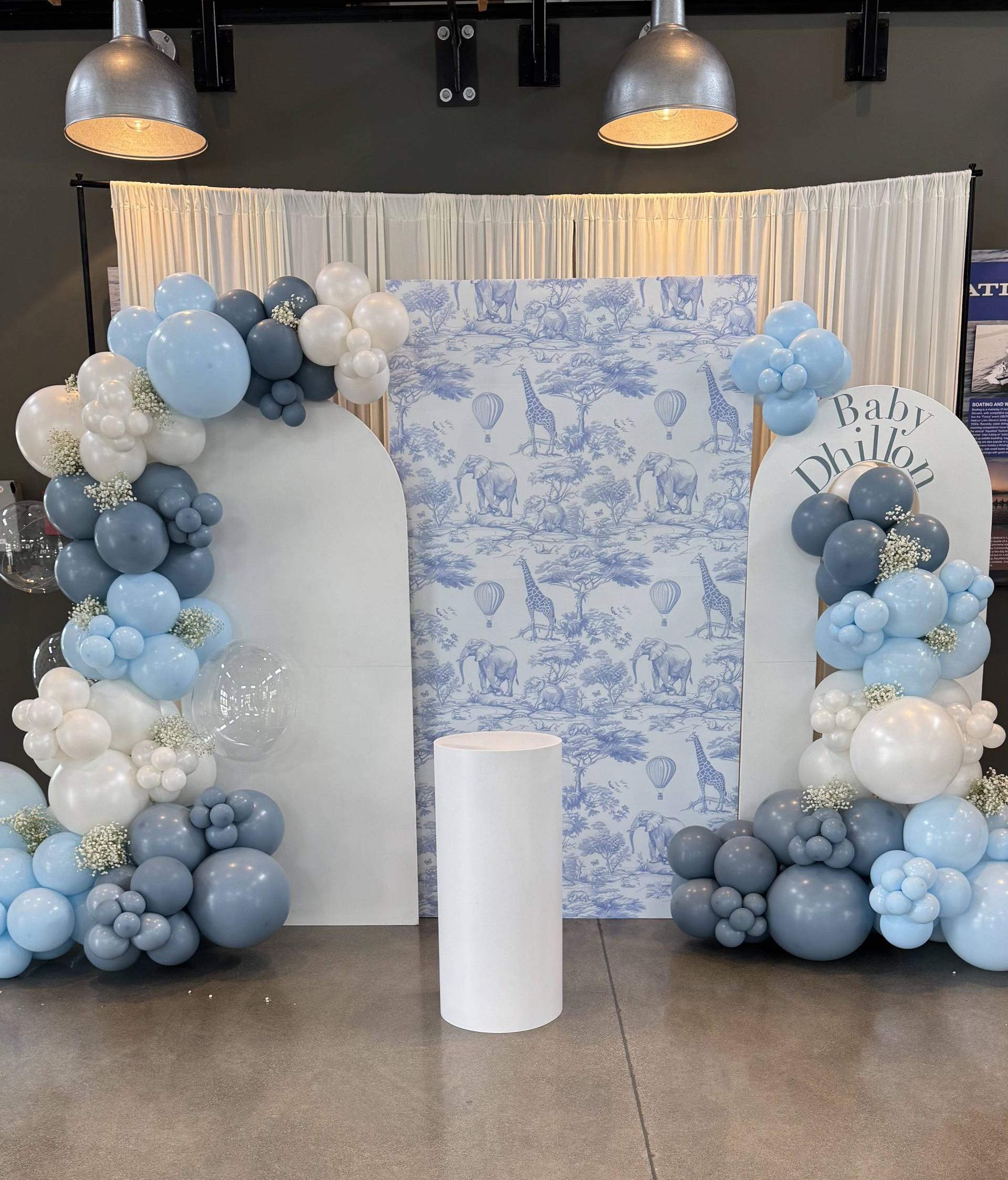 baby birthday party with blue balloons
