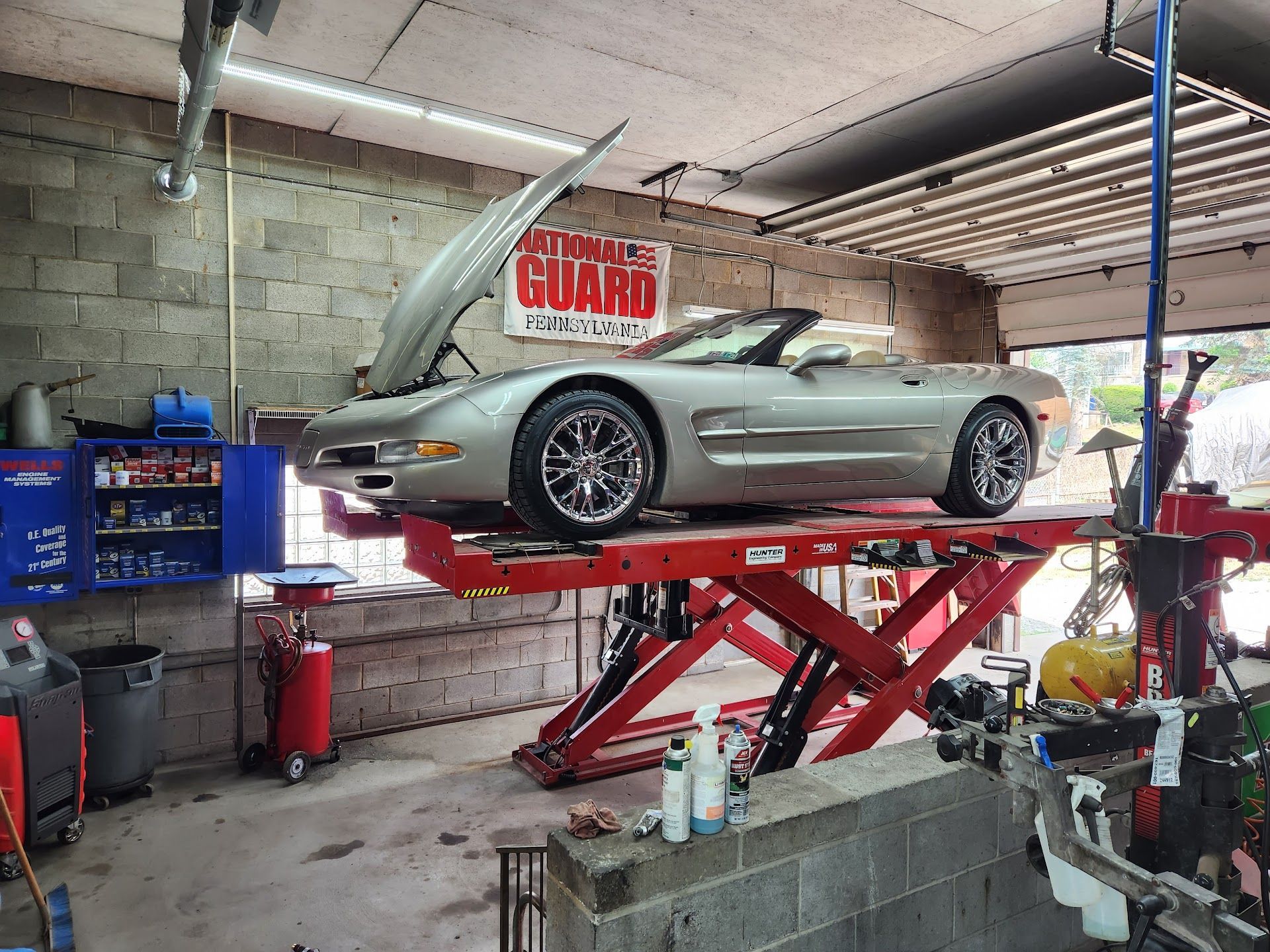 Patrol Car in Shop | Tire & Brake Outlet