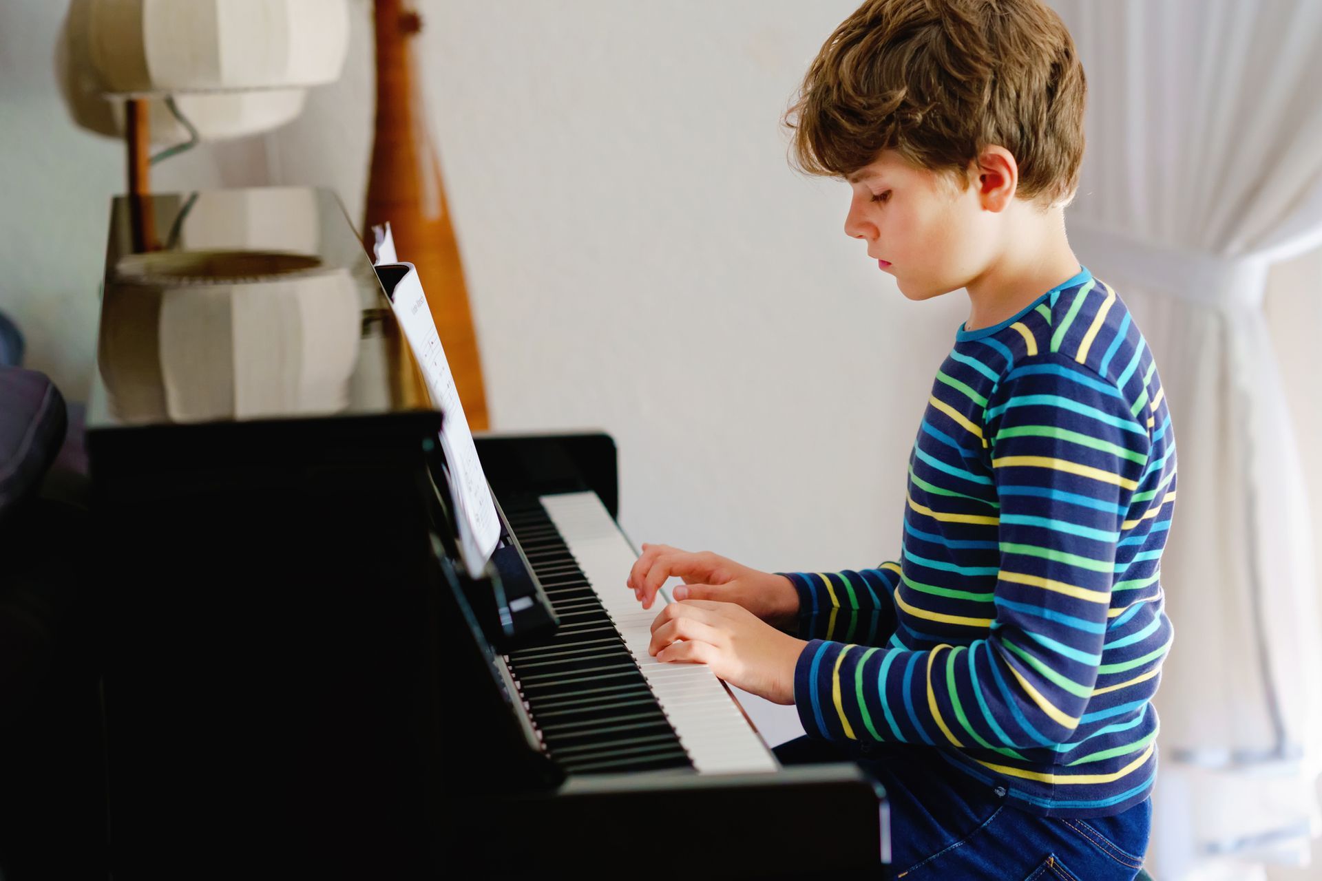 A Woman Is Teaching A Little Girl | Clayton, NC | Neighborhood Academy of Music