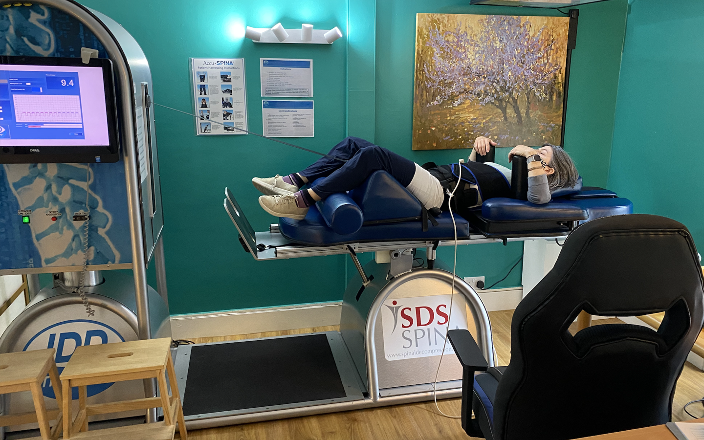 A person being treated with IDD therapy at Naval Mair Physical Medicine