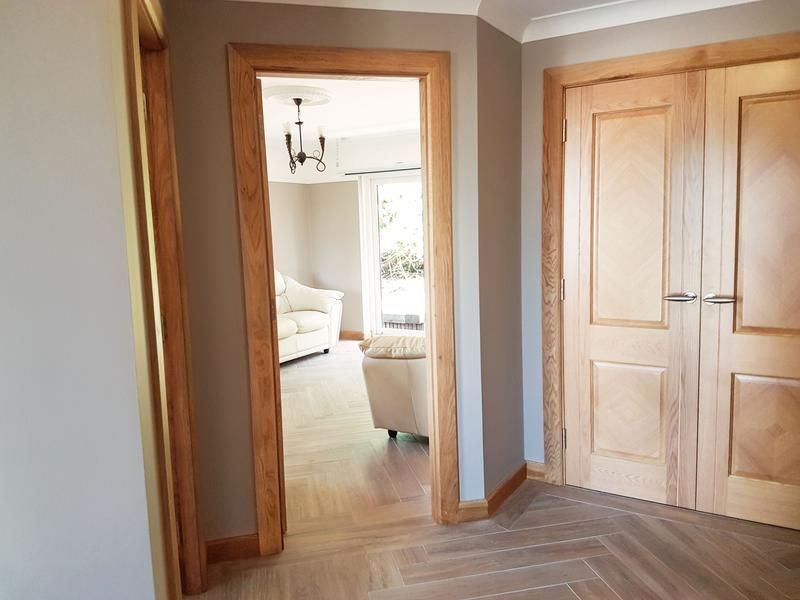 A picture of a hallway painted grey by Elite EdgePainters and Decorators Manchester