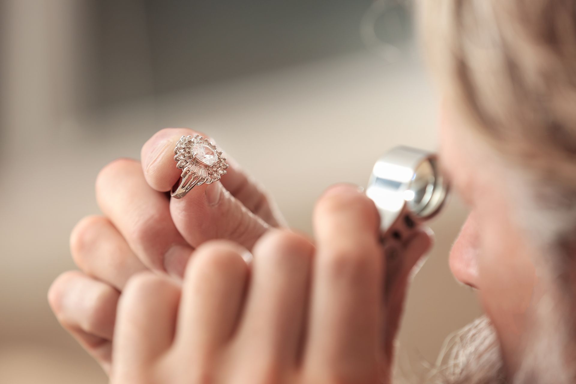 Jeweler inspecting a ring