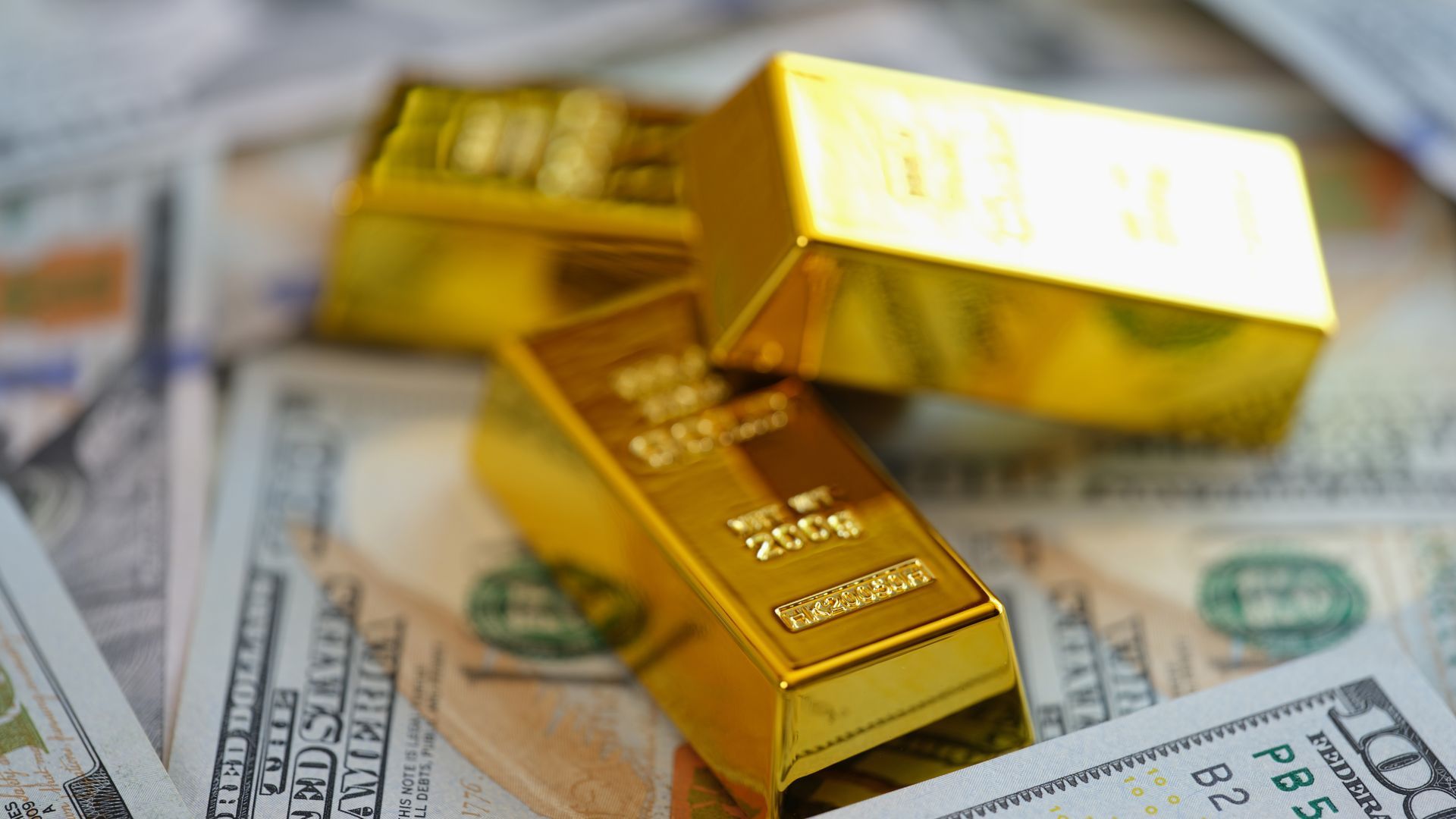 Gold bars on US dollars.