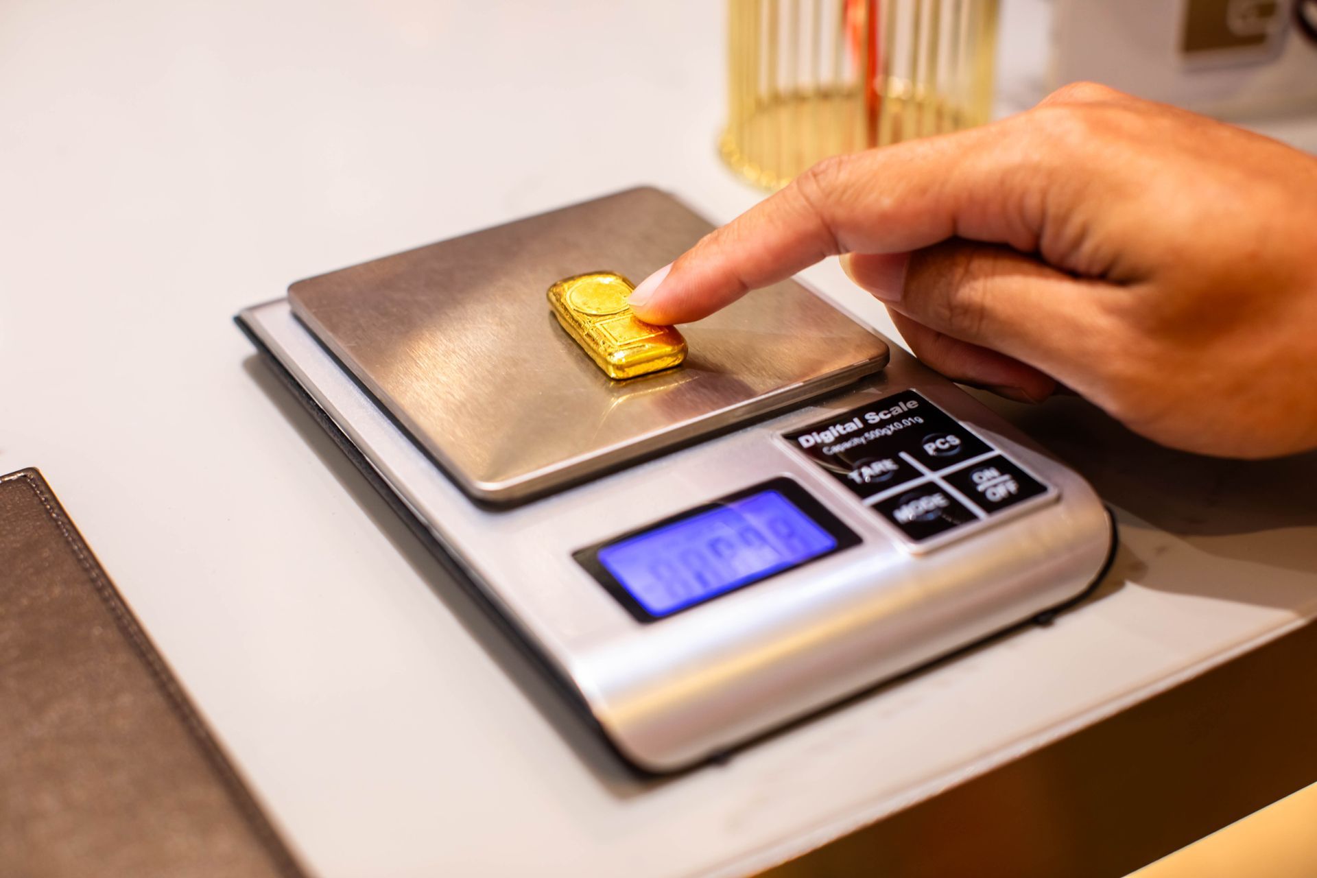 Gold on digital scale. Gold on digital scale.