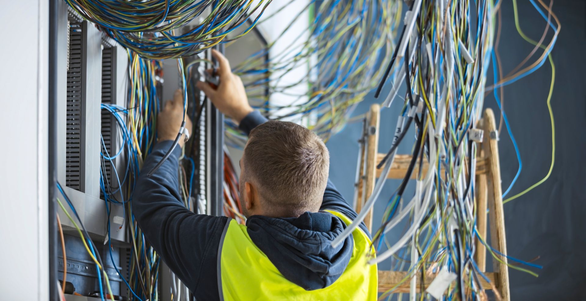 A Electrical contractor working in a commercial construction 