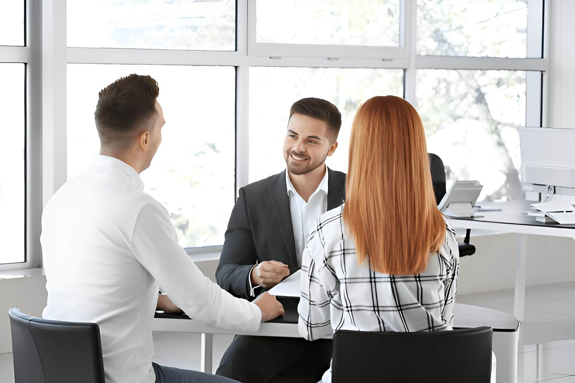 A Two Client is Having a Discussion With The Lawyer— O'Reilly & Sochacki Lawyers in Gold Coast, NSW