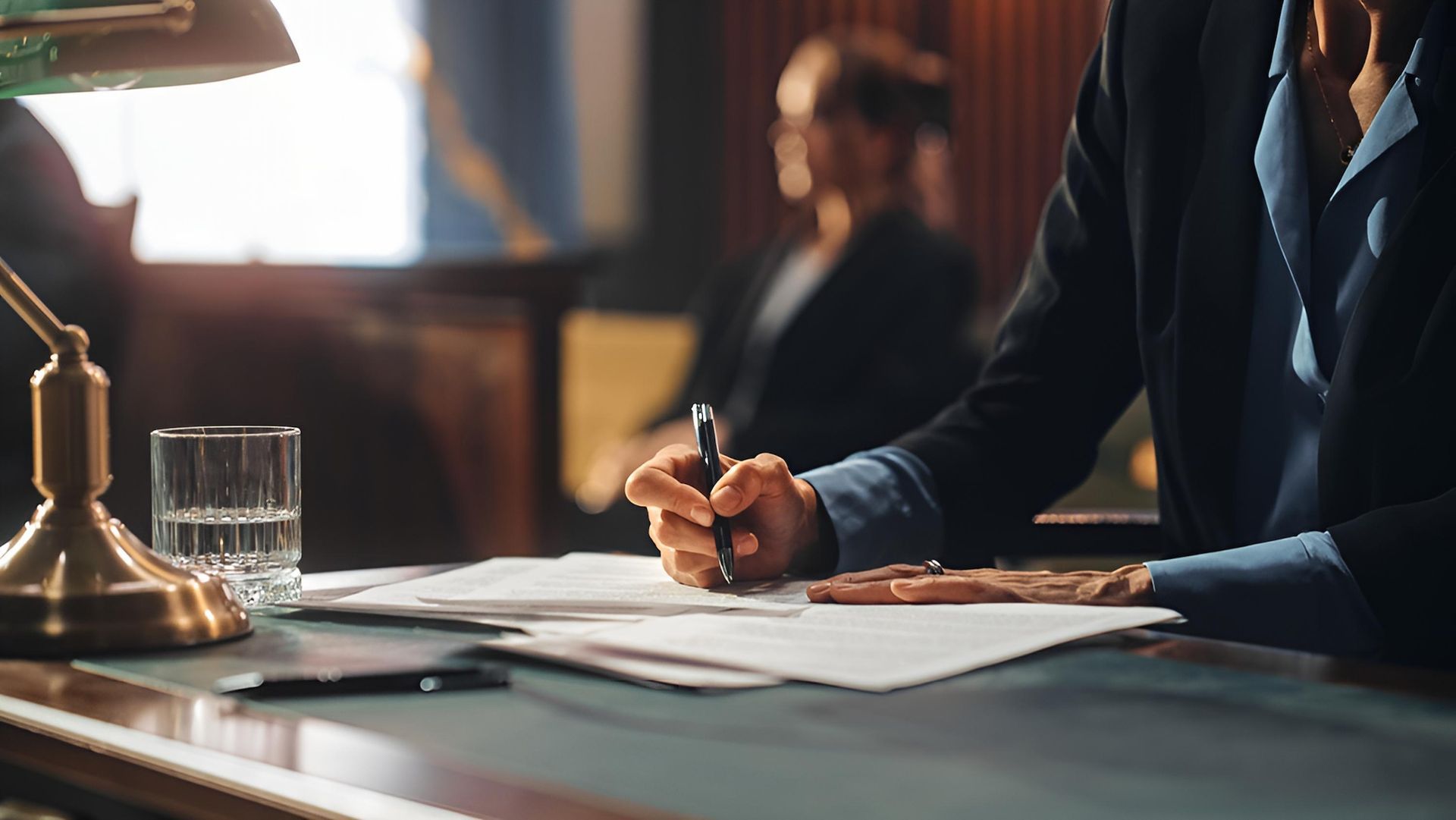 Lawyer is Seriously Talking to the Client on the Table — O'Reilly & Sochacki Lawyers in Kingscliff, NSW