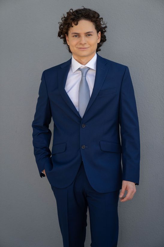 Brandon Cohen, Florida real estate agent, in a suit for professional profile.