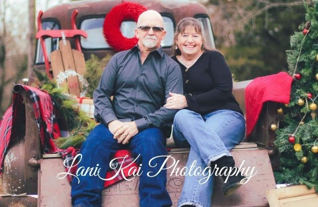 Happy Couple Sitting Together