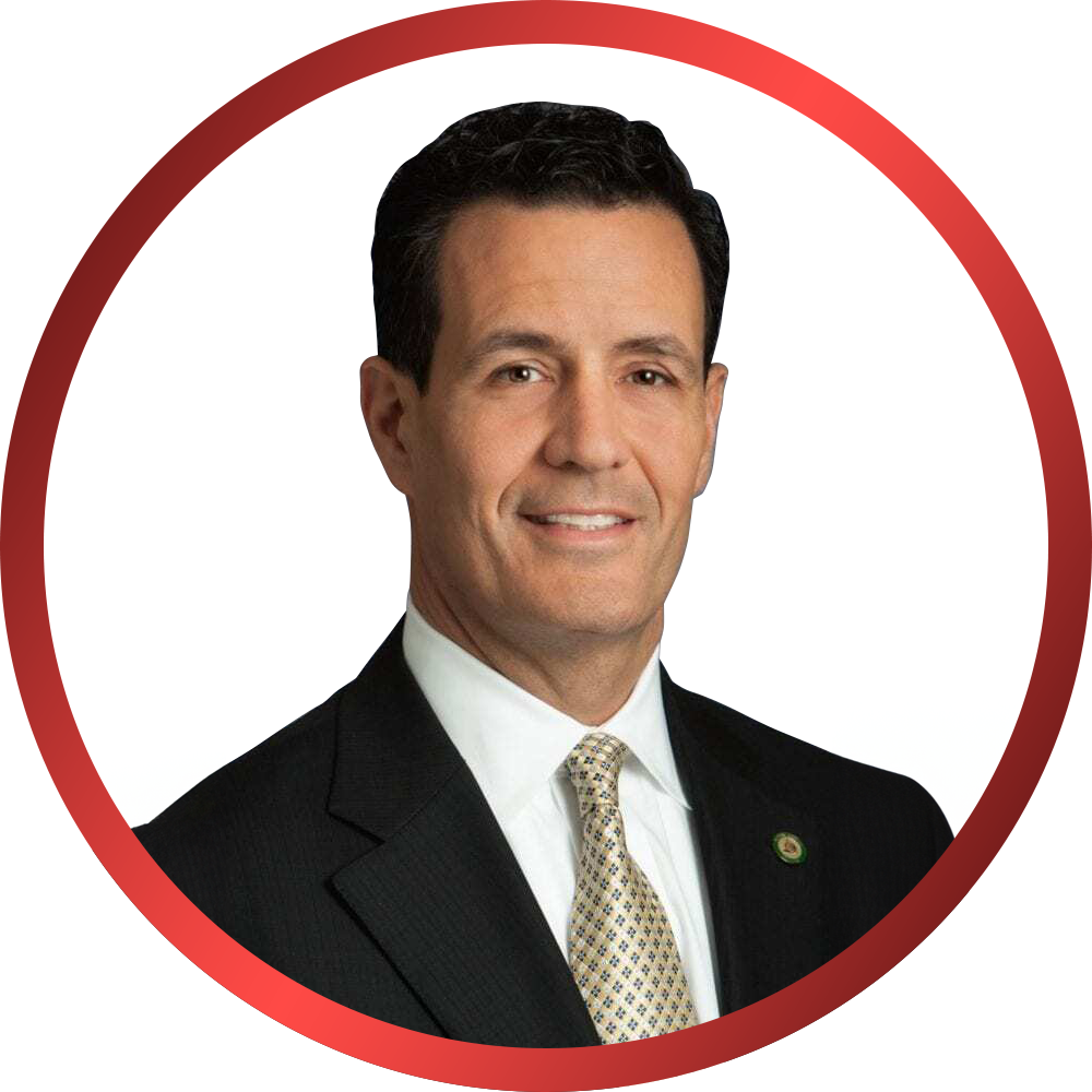 A man in a suit and tie is in a red circle