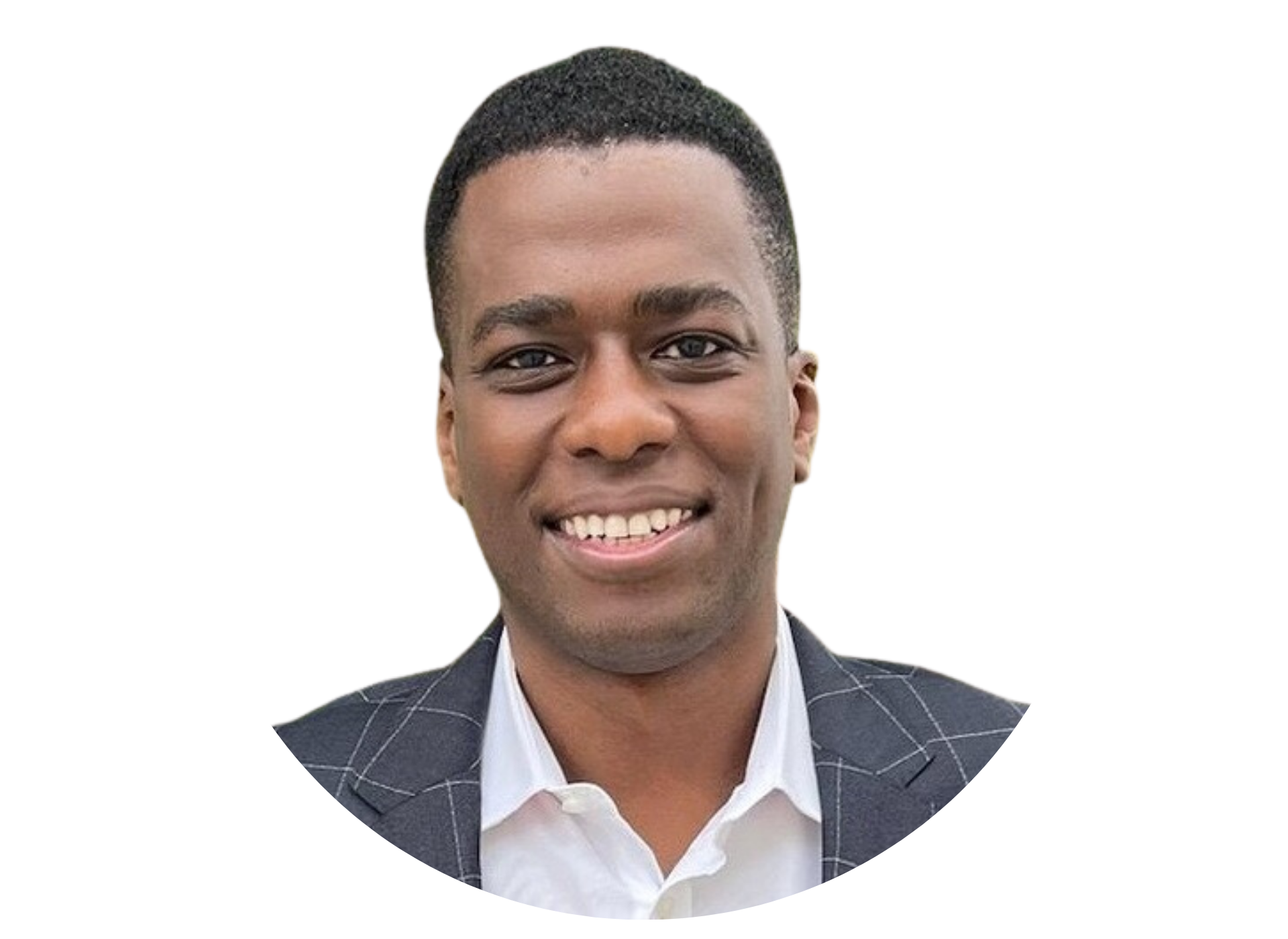 A man in a suit and white shirt is smiling for the camera.