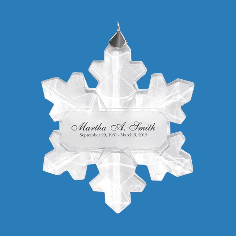 A snowflake ornament with the name martha a smith on it