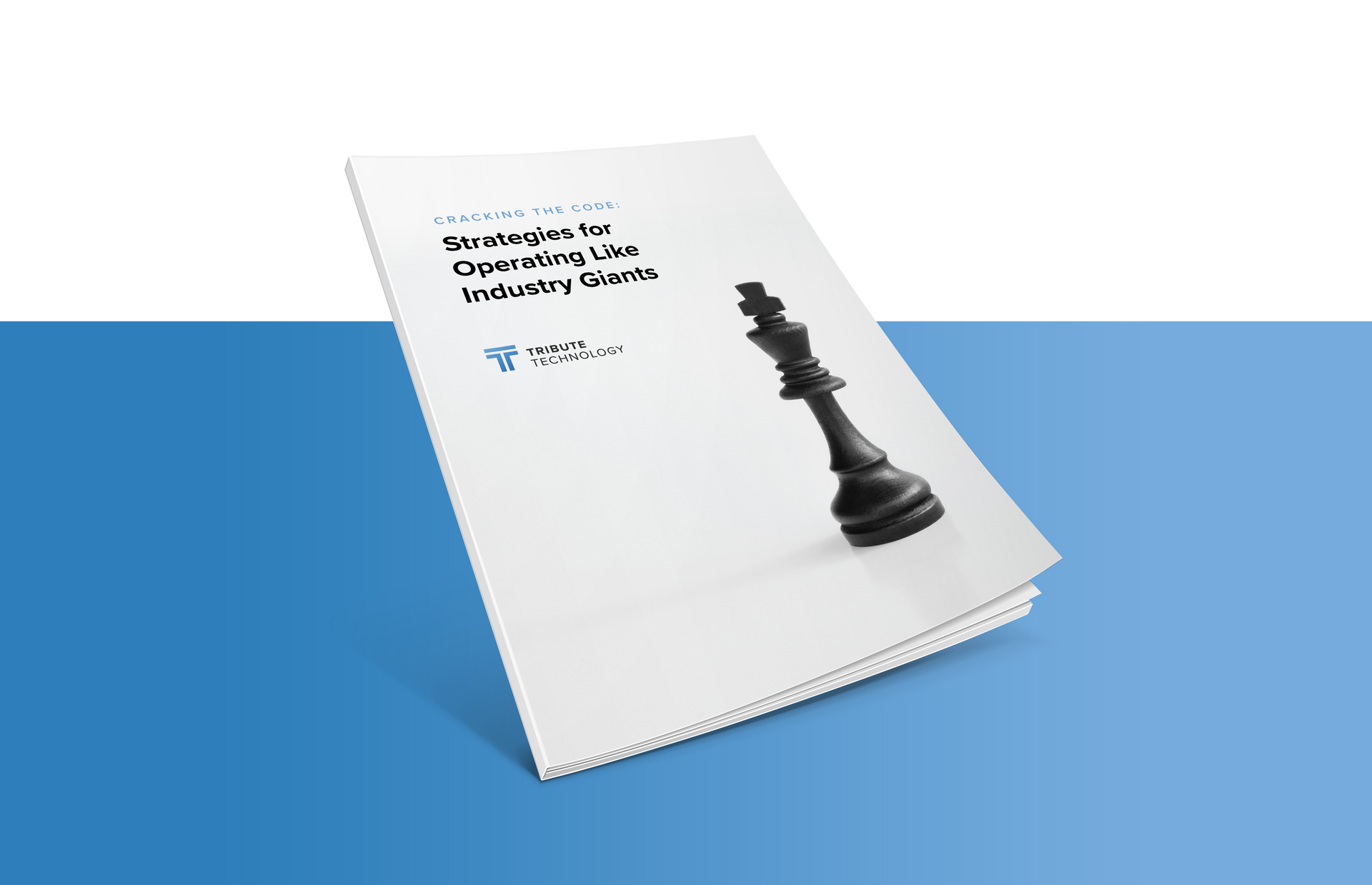 A book with a chess piece on the cover is sitting on a blue table.
