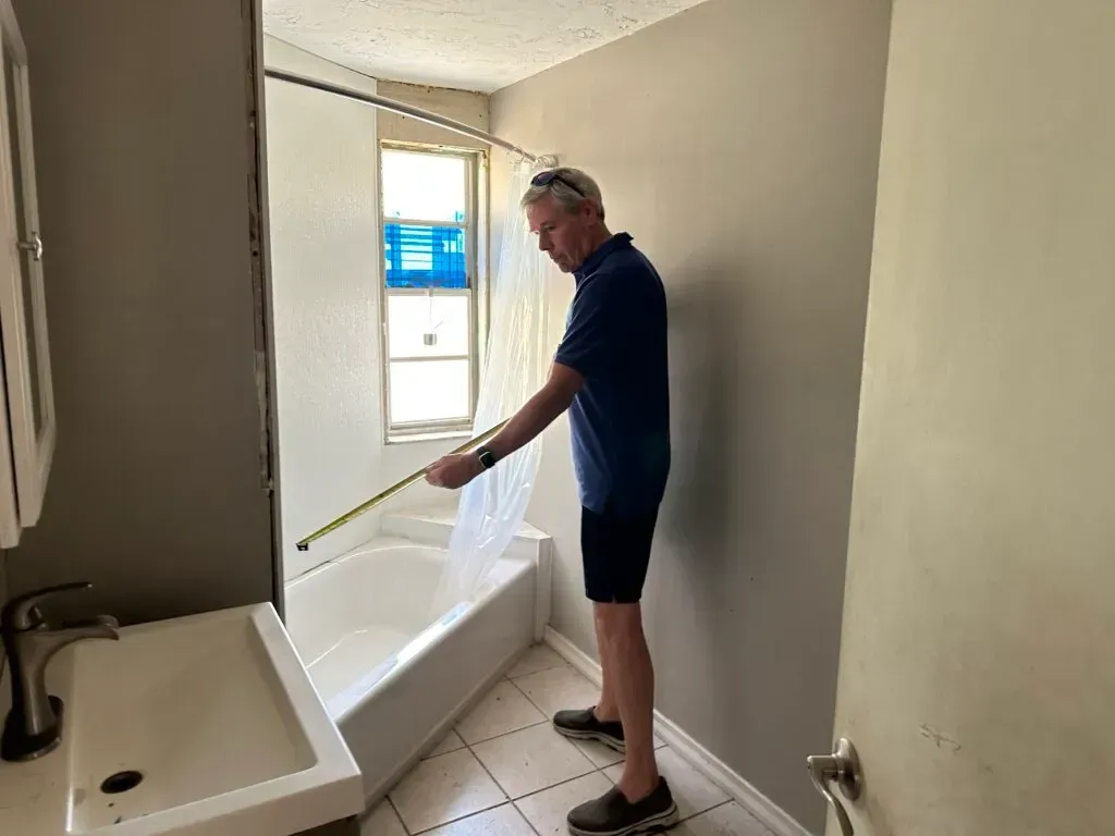 Bill Taking Measurements | Sarasota, FL | Home Buyers Plus, LLC