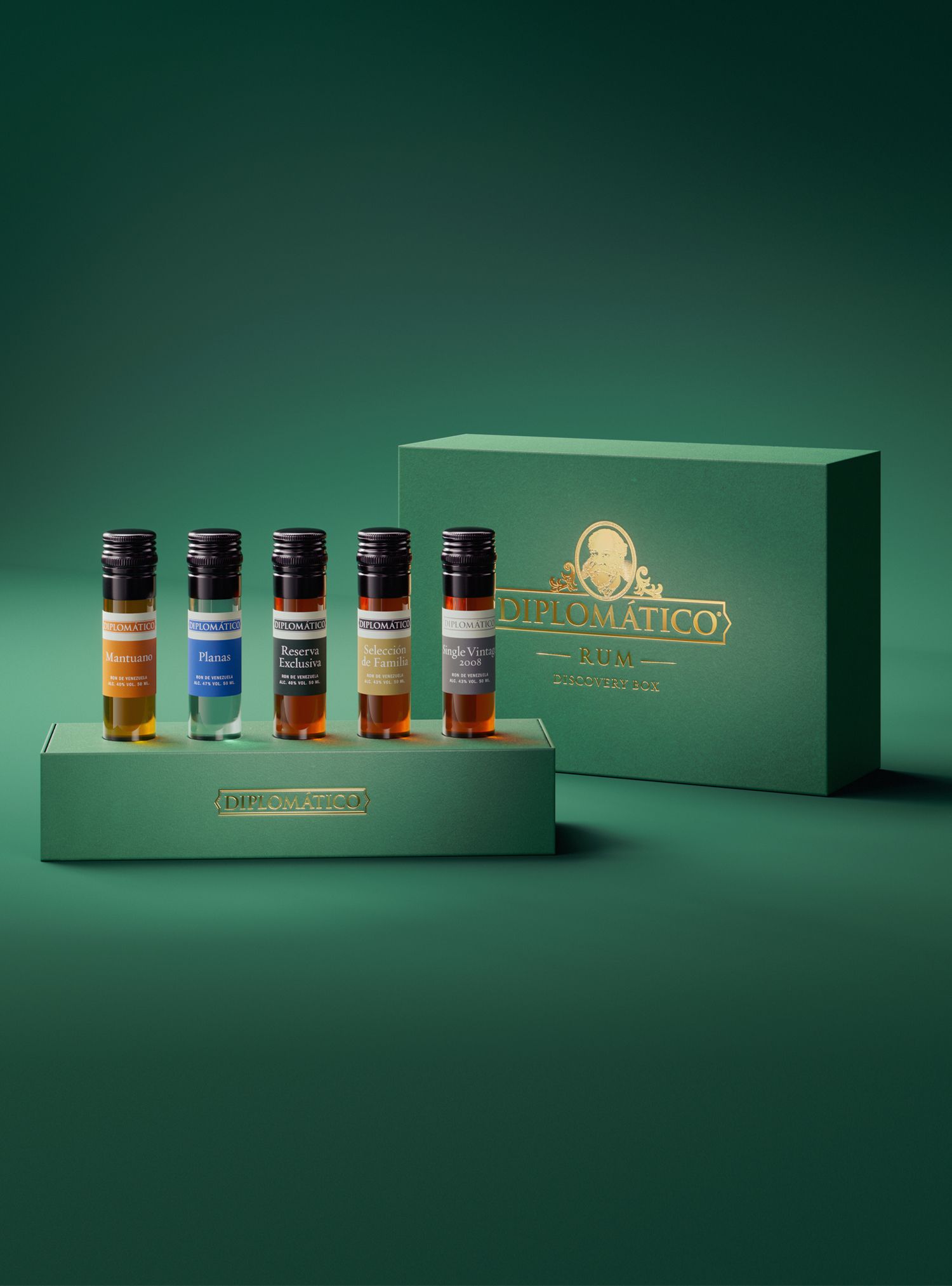 Five small bottles of liquor in a green box set on a green surface with a green box in the background.