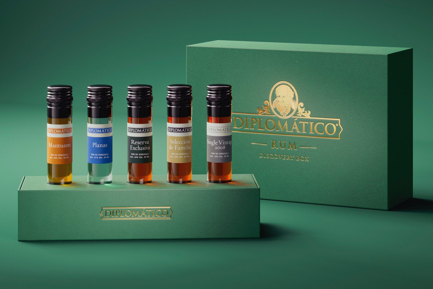 Diplomático rum tasting set with five sample bottles on a green stand and box.