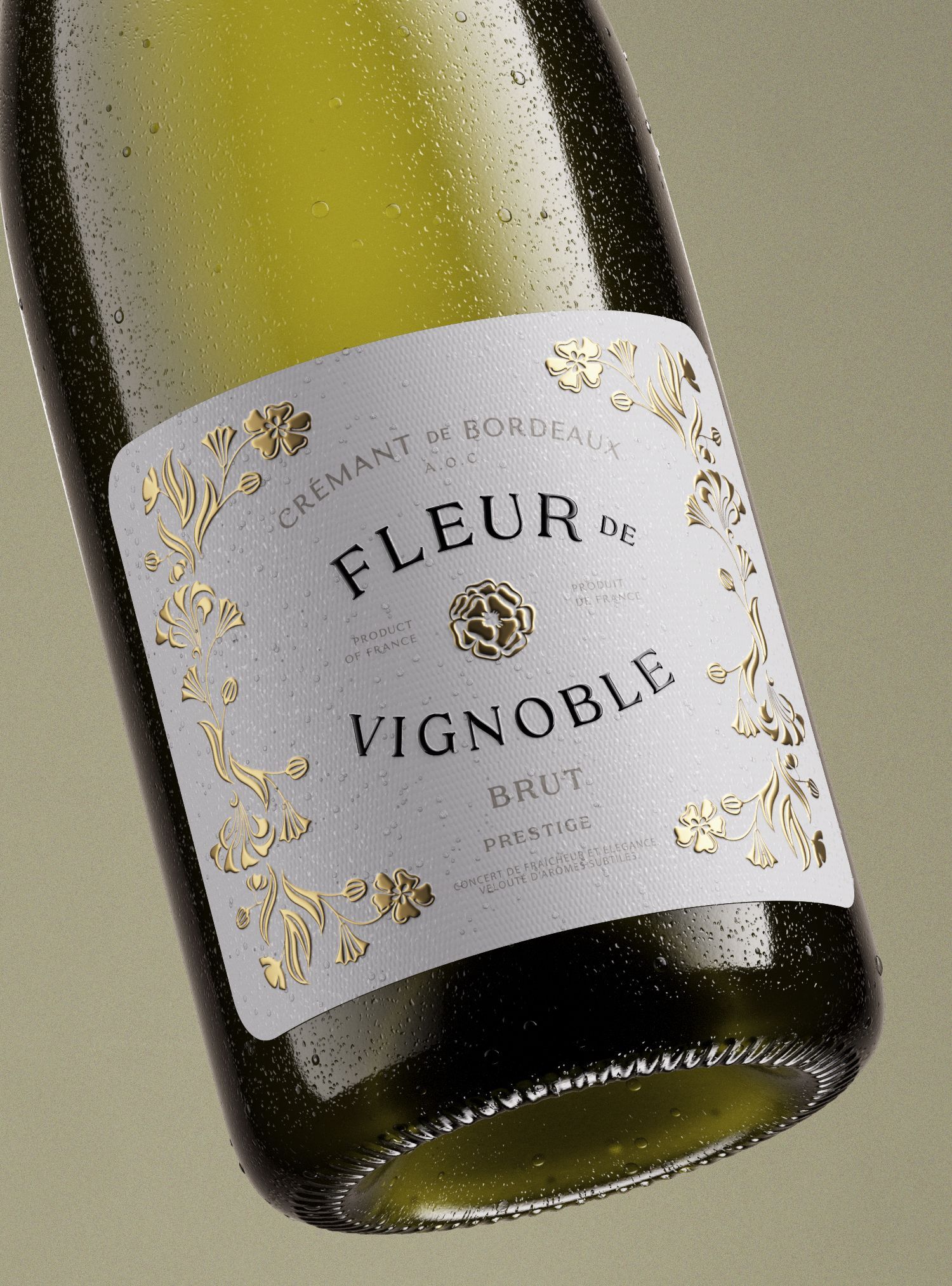 Bottle of Fleur de Vignoble Brut sparkling wine with a white label and gold accents.