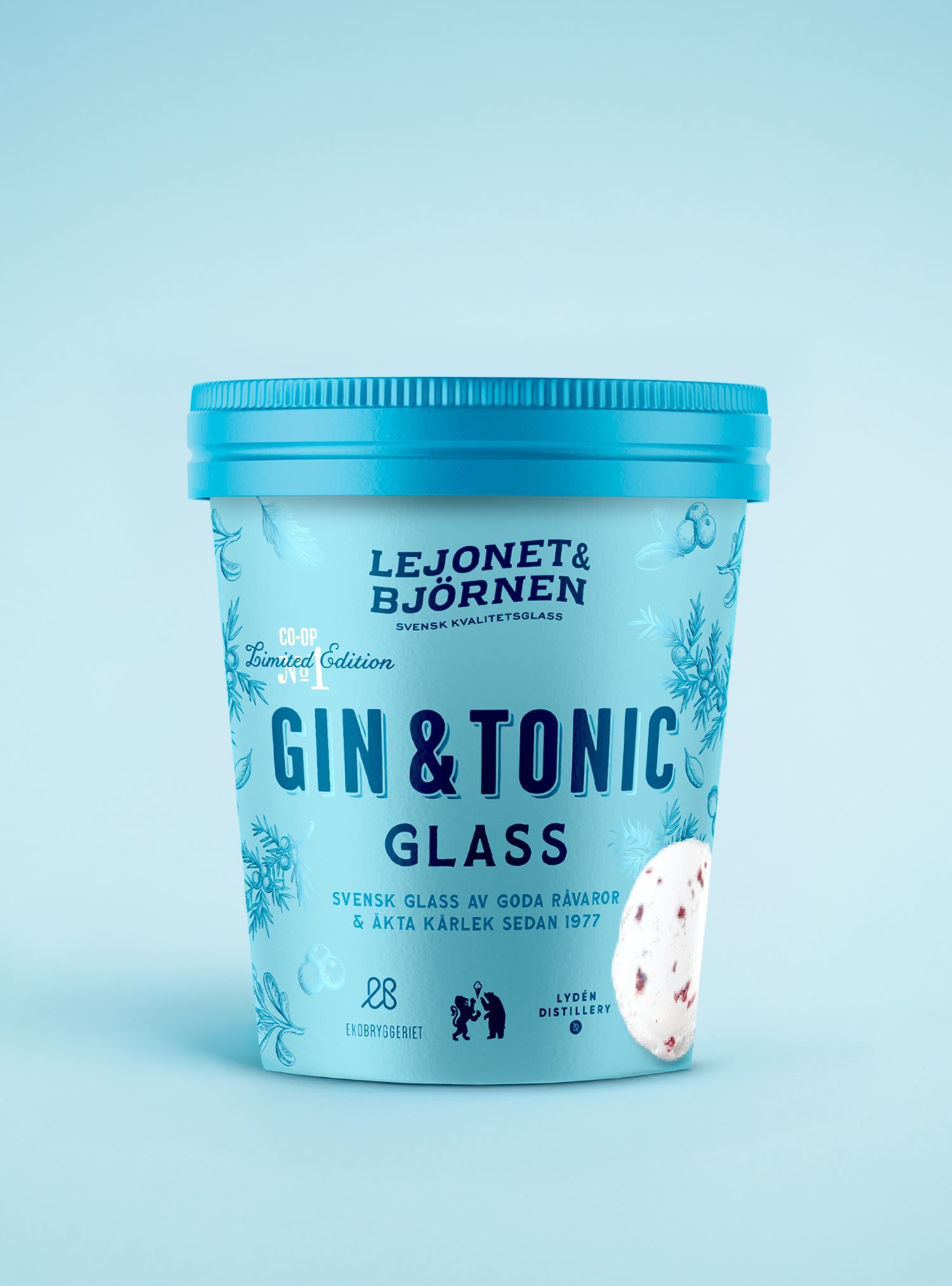 Light blue ice cream tub of Gin & Tonic Glass flavor, with blue lid, against a light blue background.
