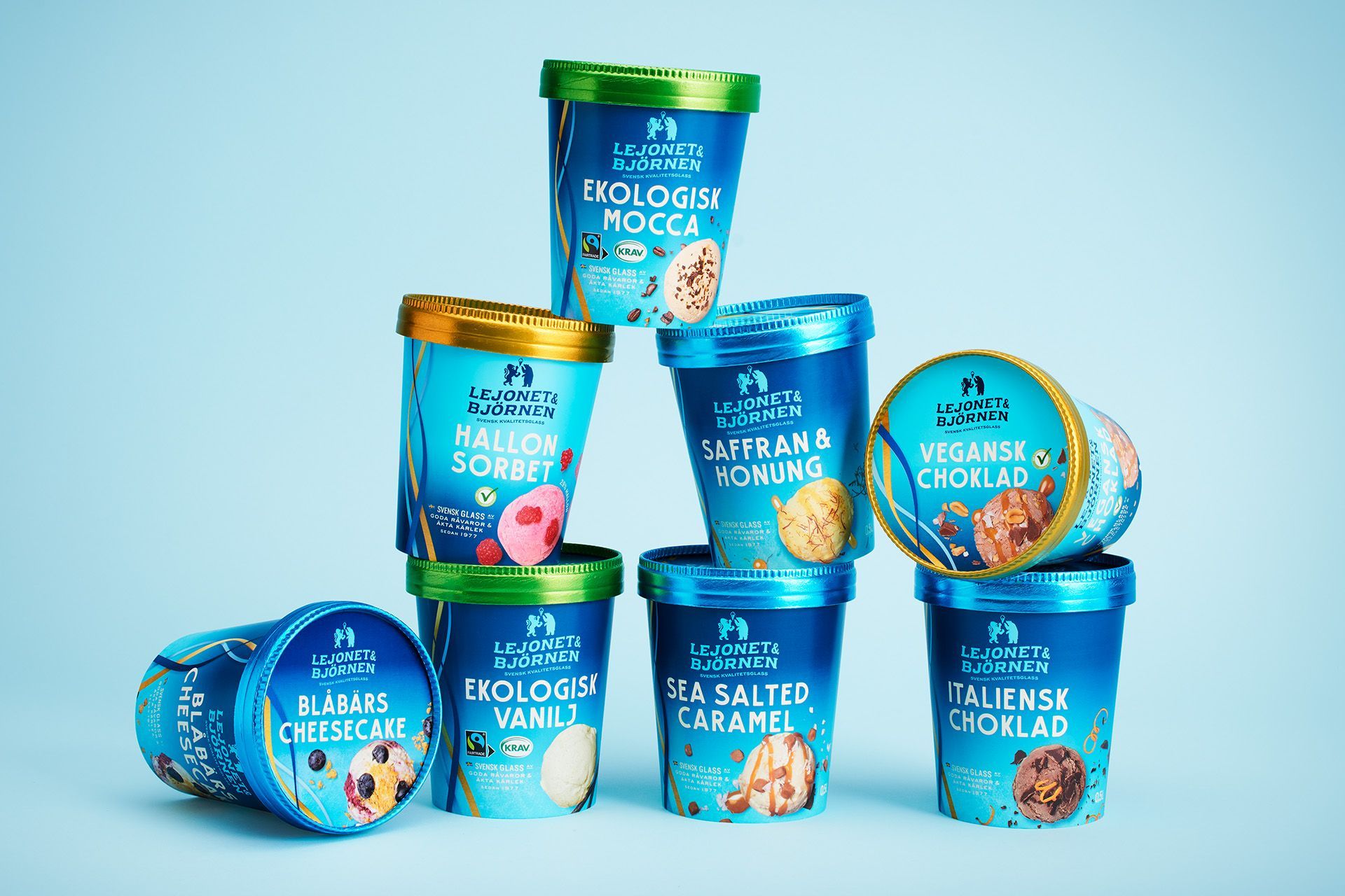 Several colorful ice cream tubs stacked; flavors include dulce de leche, salted caramel, and vanilla from Lejonet & Björnen.