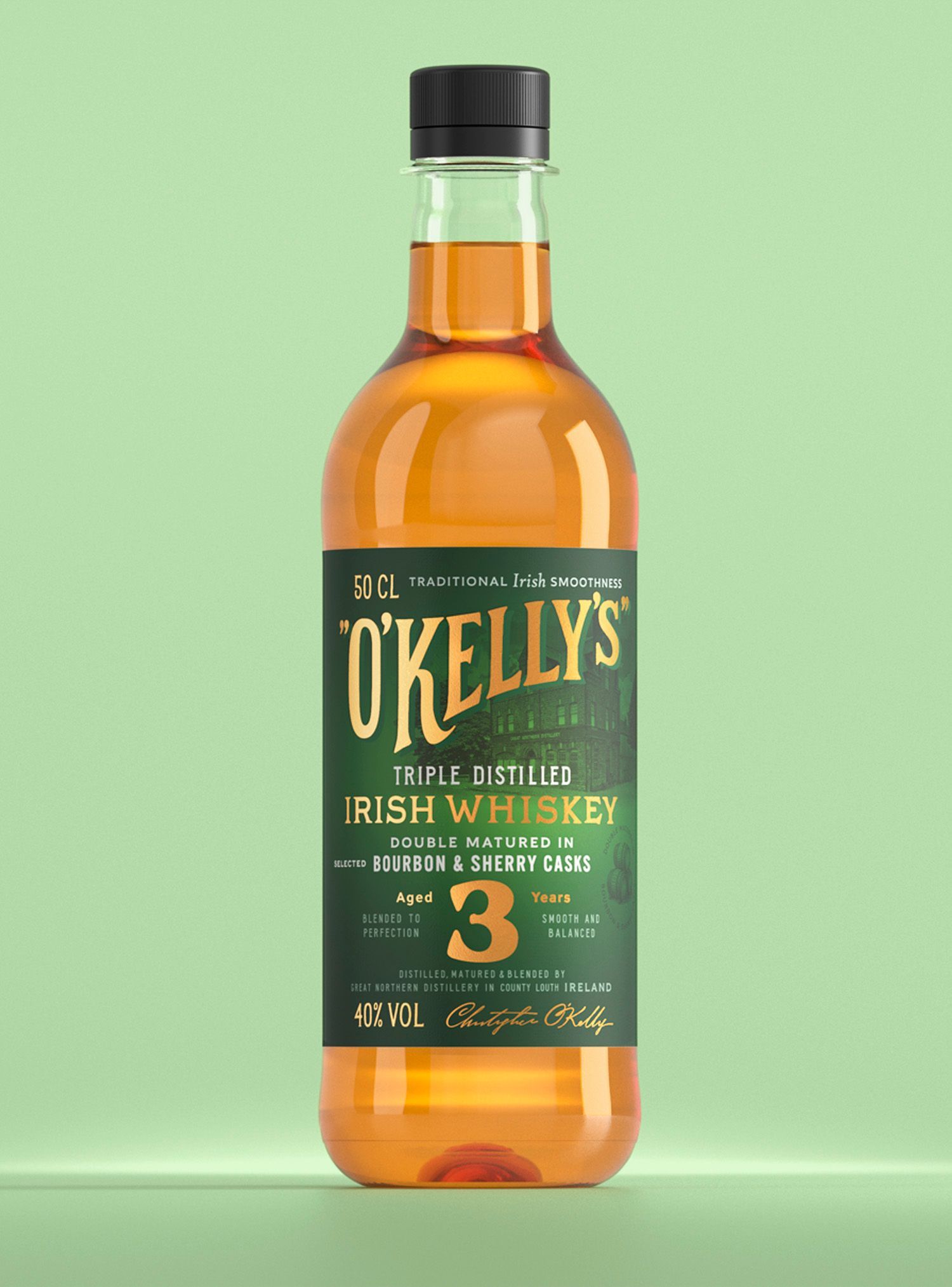 Bottle of O'Kelly's Irish Whiskey. Green label, gold liquid, black cap, set against a green background.