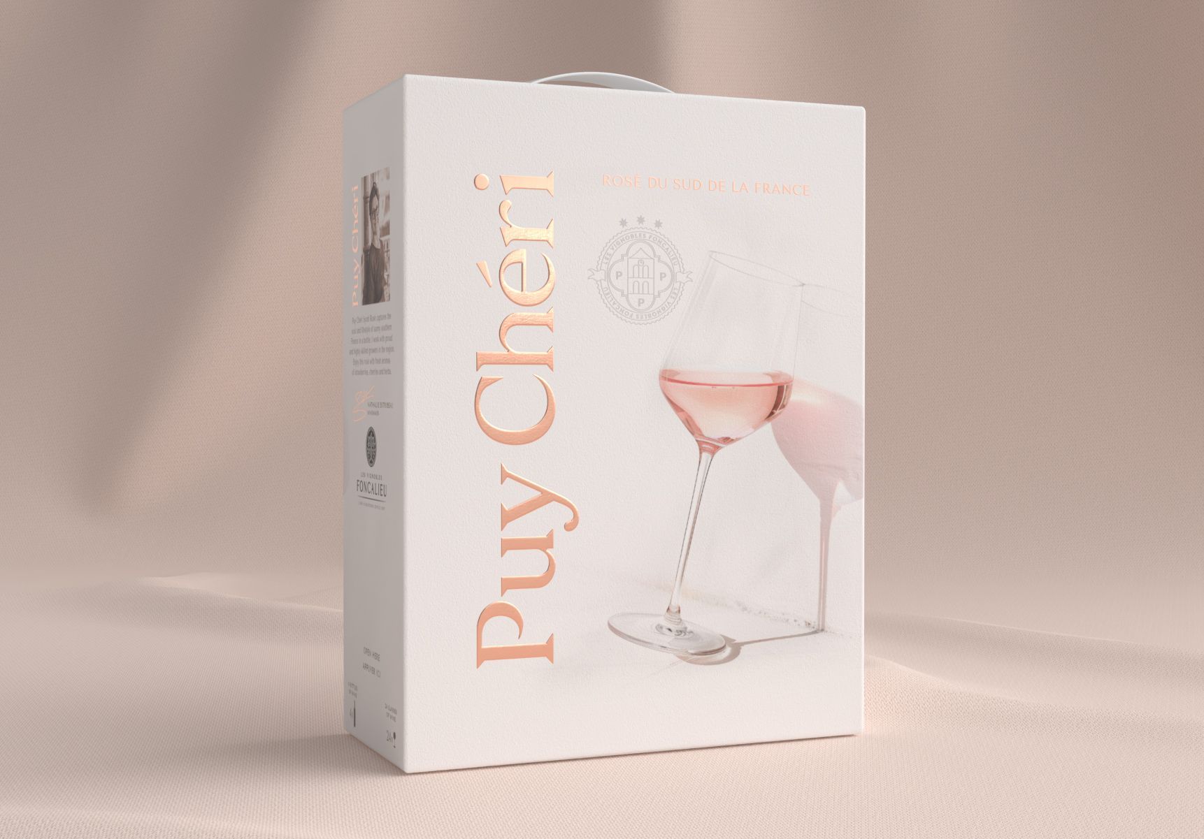 BIB of Puy Chéri rosé wine. Light background, elegant design with wine glasses.