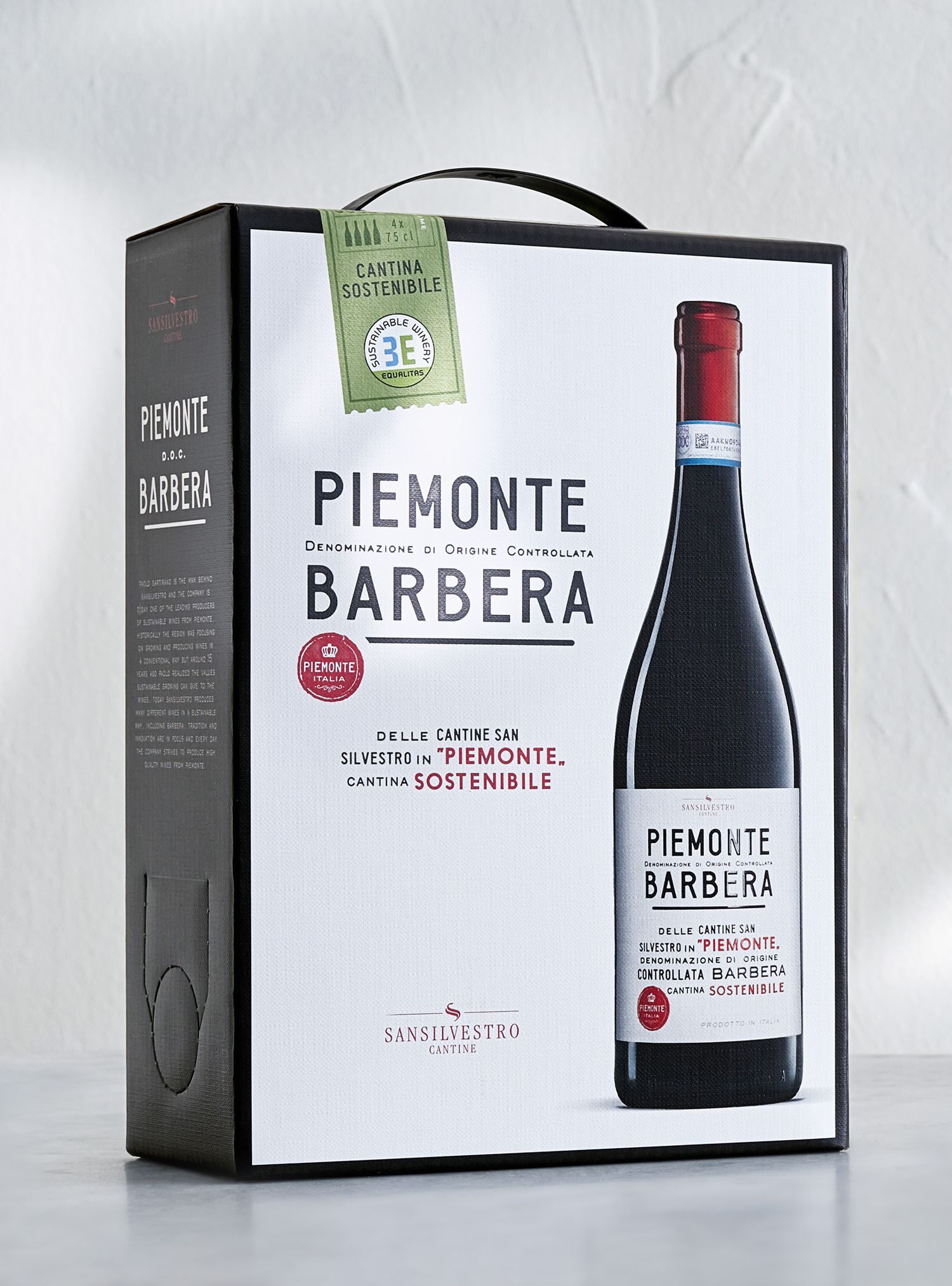 Box of Piemonte Barbera wine with handle, bottle illustration. Black and white, red accents.