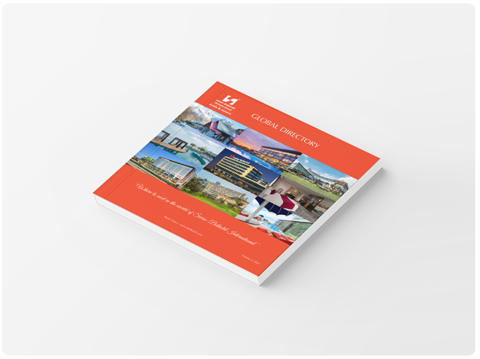 A square brochure with an orange cover and photos of resort amenities.