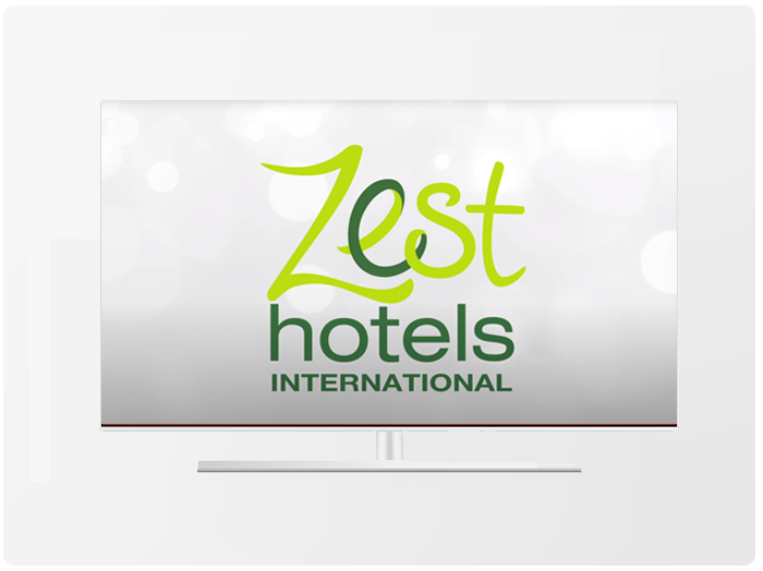 Logo for Zest Hotels International on a white screen with a simple base.