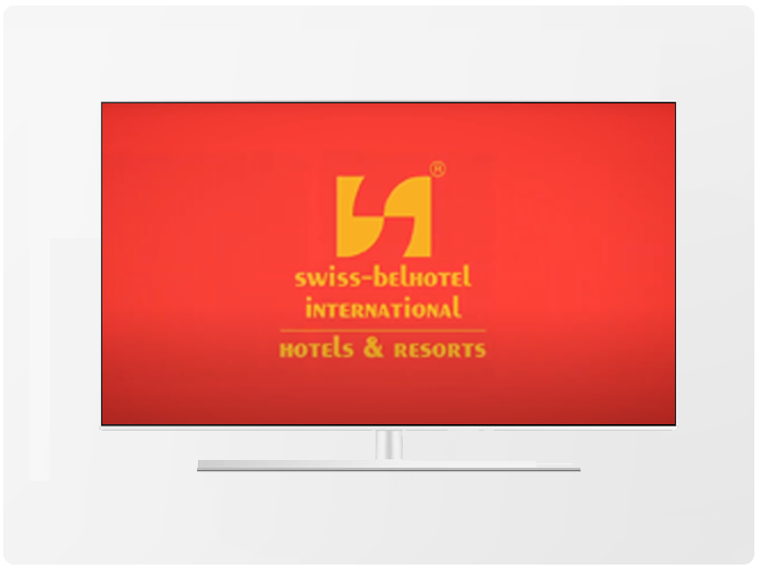 Swiss-Belhotel International Hotels & Resorts logo on a red background displayed on a white framed screen.