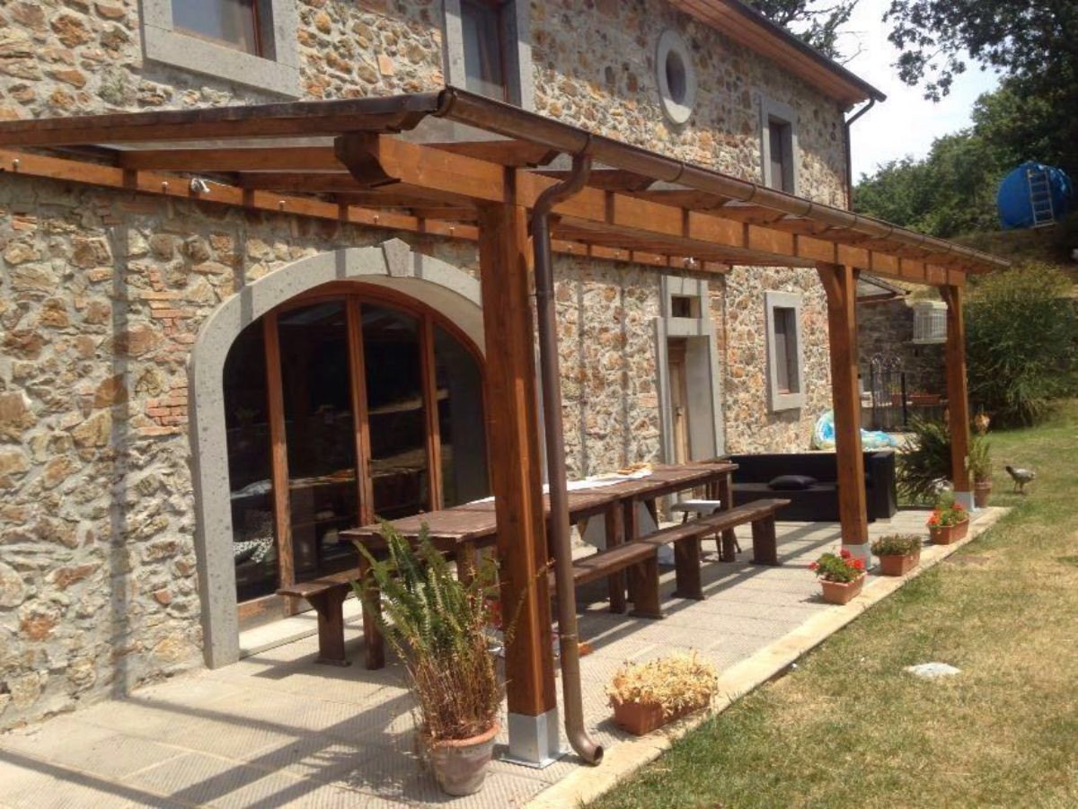 casa con pergola in legno