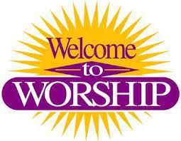 A welcome to worship sign with a sunburst in the background.