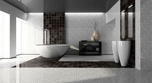 Modern bathroom with white tub, sinks, dark tiled floors, and decorative vases.