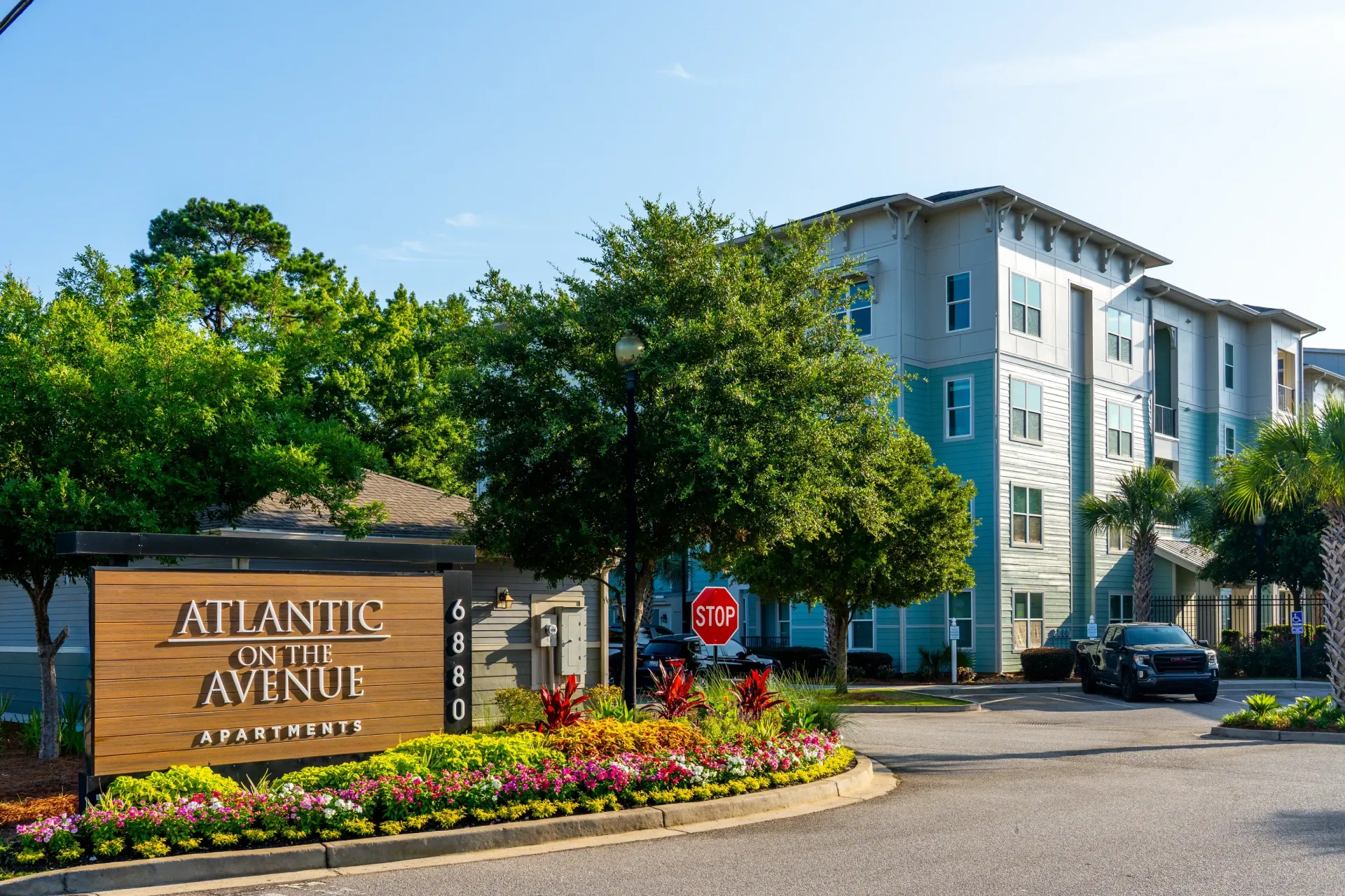 Atlantic on the Avenue Apartments monument sign and building exterior at Atlantic on the Avenue in North Charleston, SC.