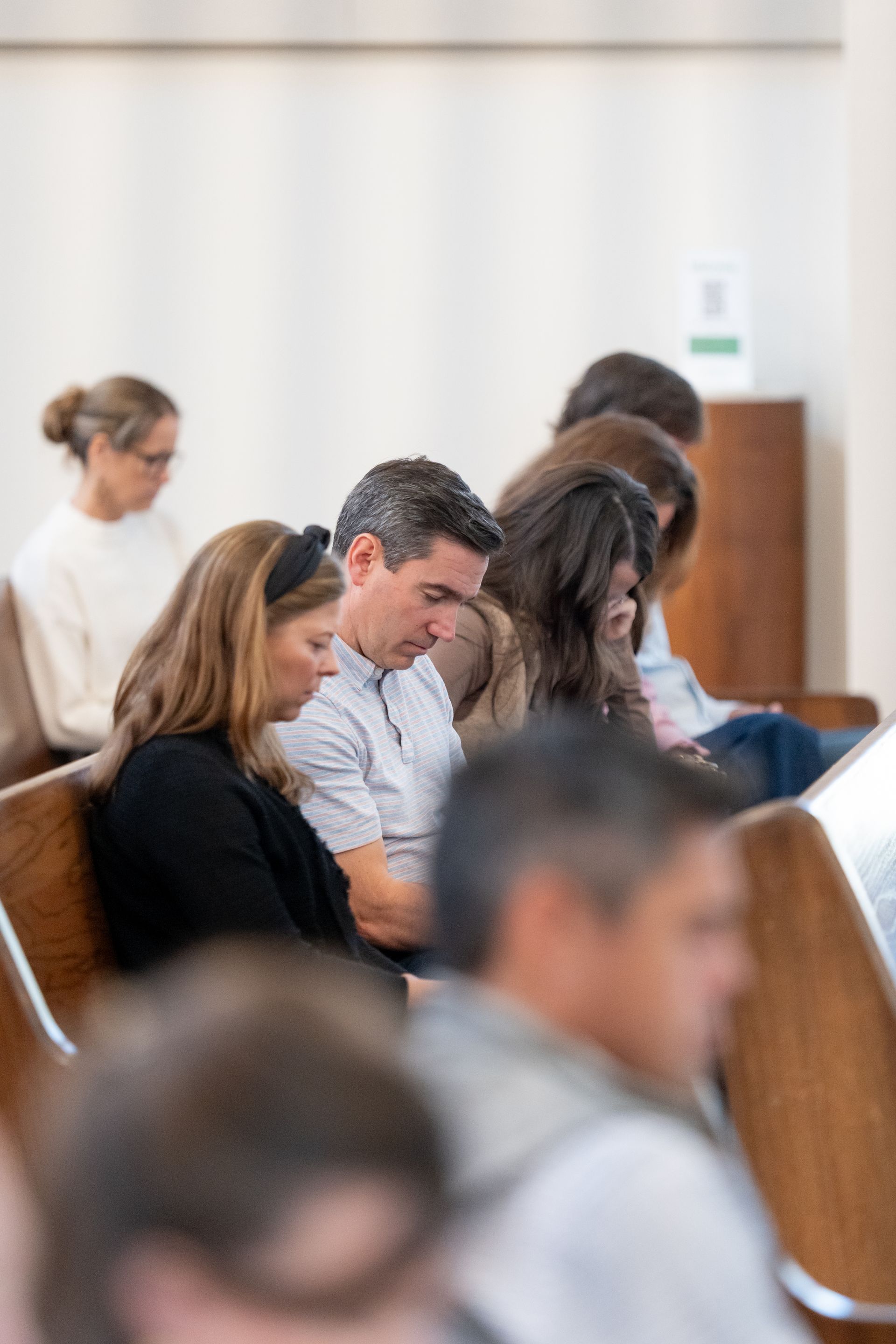 People praying during worship