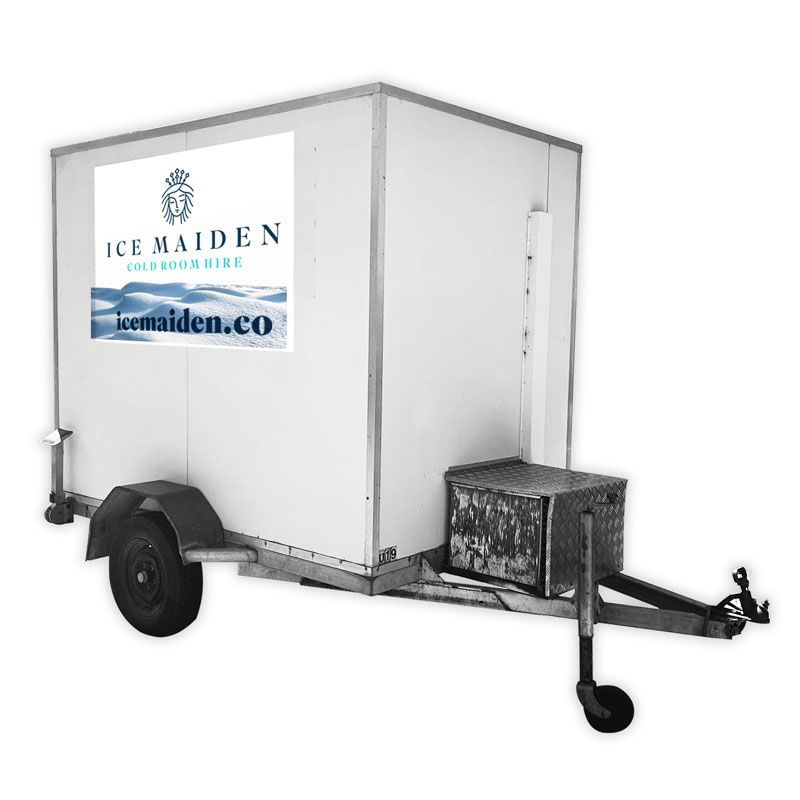 A white trailer with ice maiden written on the side