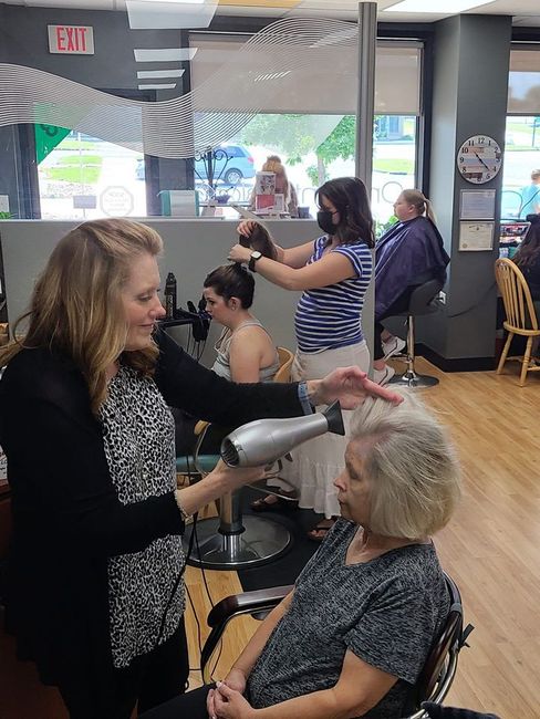 Hair Stylist And Customers at On Point Salon