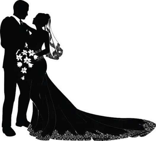 Silhouette of a couple in wedding attire embracing, with floral accents and a long flowing gown