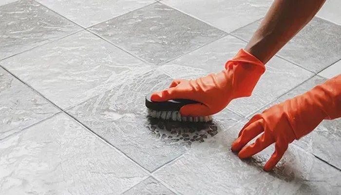 Manual grout scrubbing