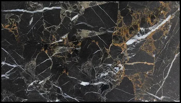 High-quality black marble surface with gold and white veining, showcasing the importance of proper sealing and maintenance.