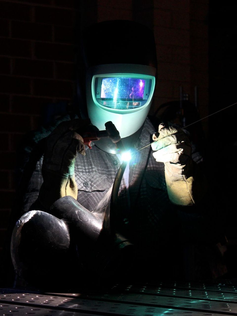 A Man Welding in Workshop — Febos Welding and Engineering In Corrimal, NSW
