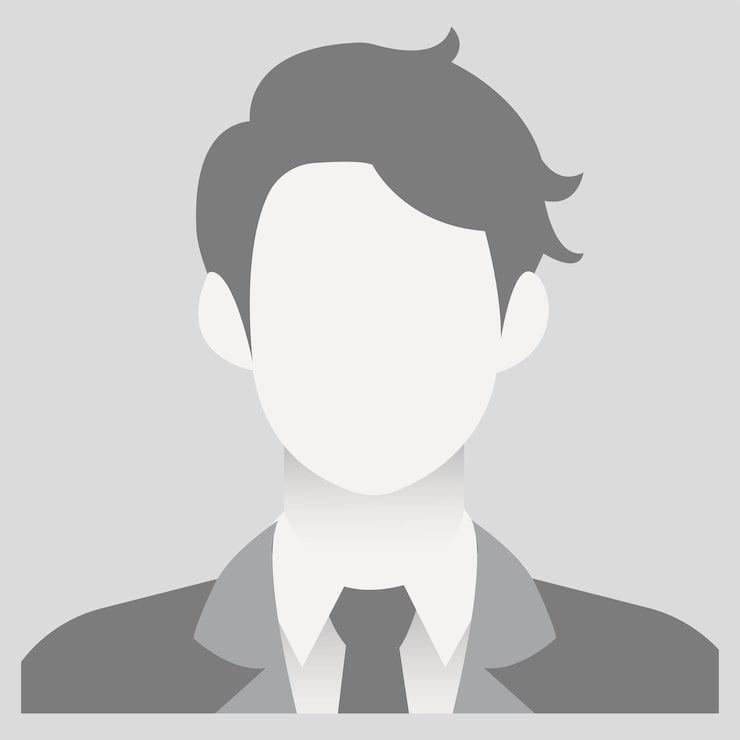 Generic avatar of a person wearing a collared shirt and tie, displayed in grayscale.