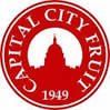 The logo for capital city fruit is a red circle with a white circle in the middle.