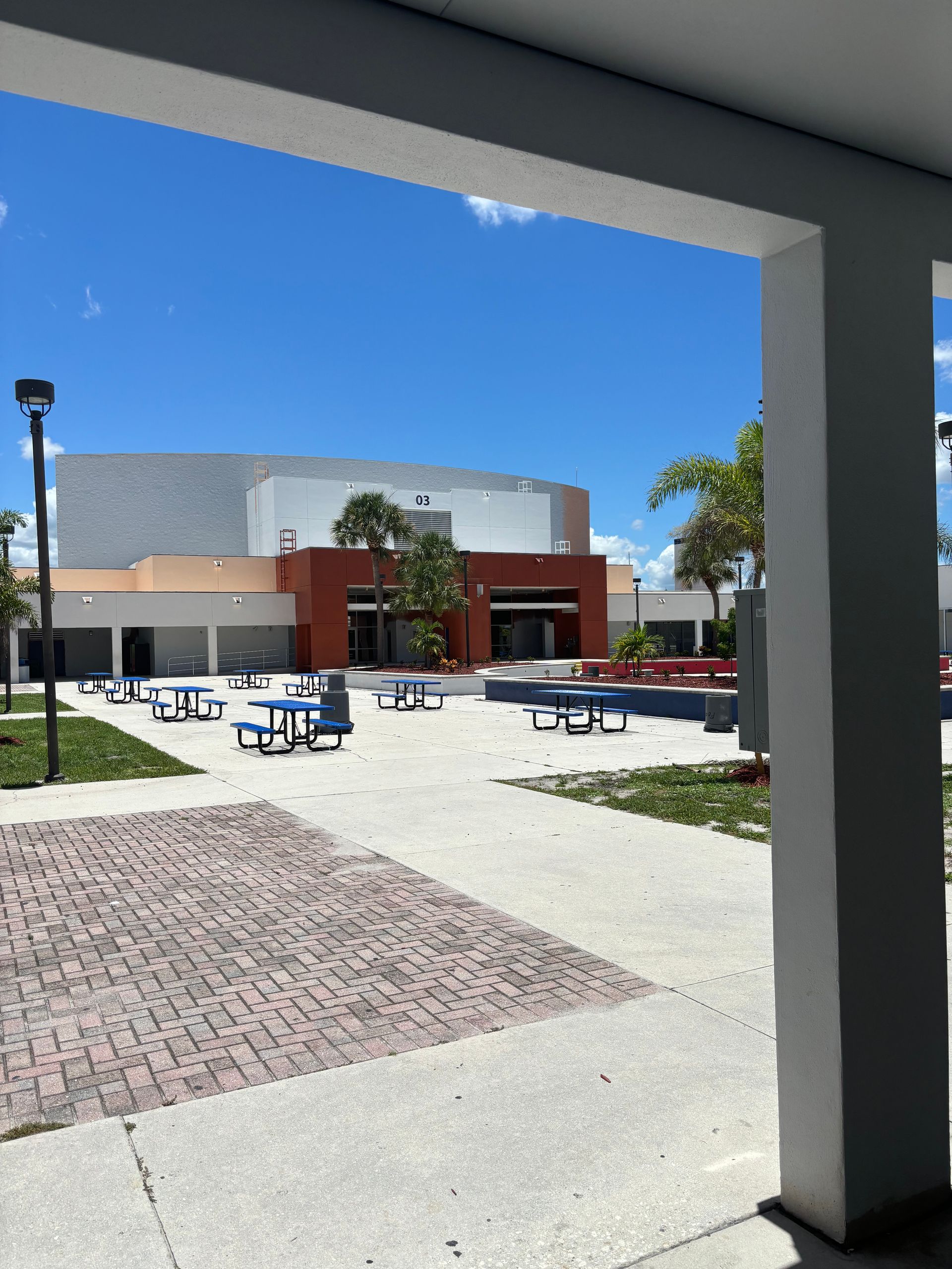 A building with a lot of benches in front of it