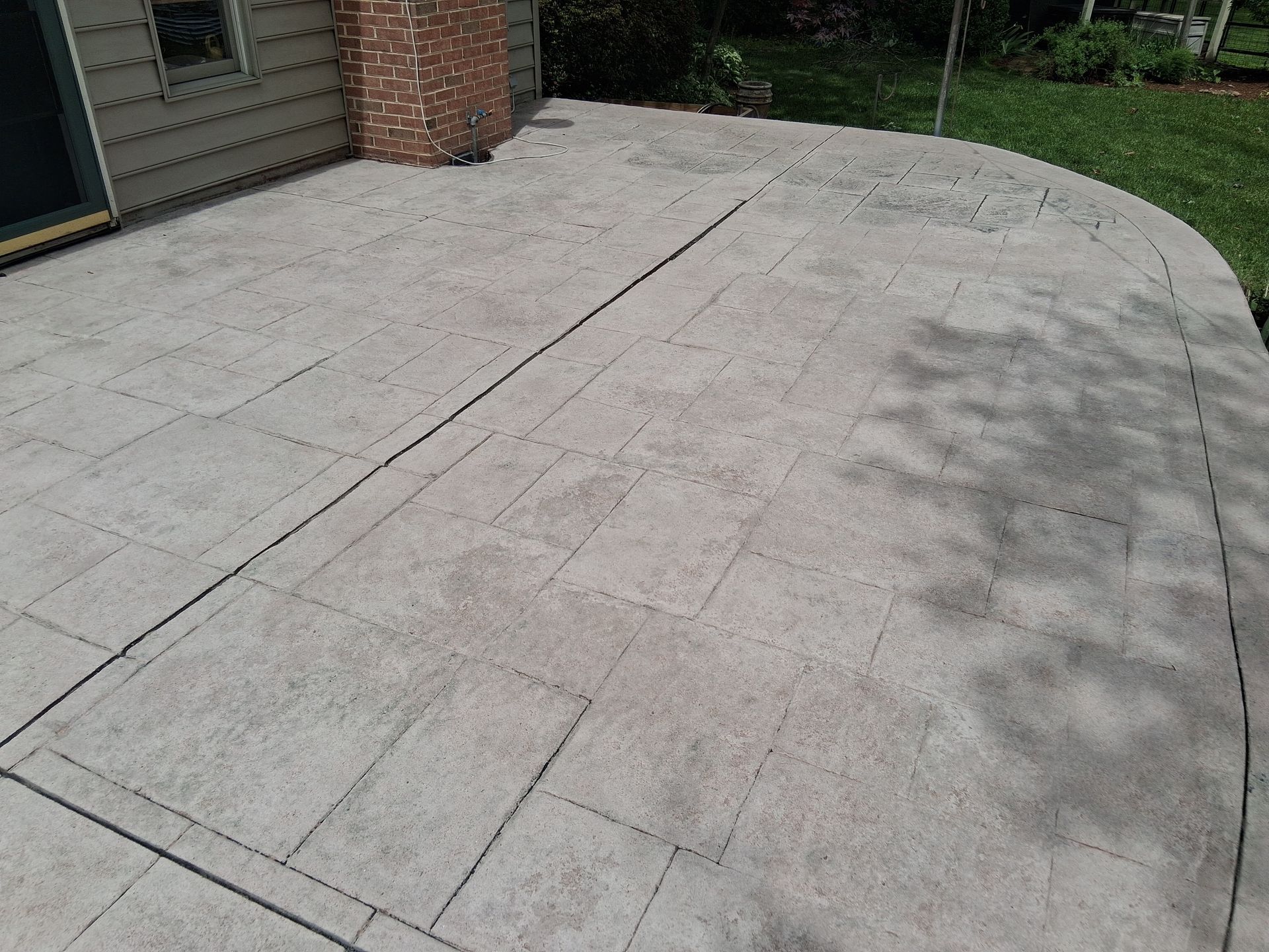 After concrete patio stain and sealer sandblasting removal in Richboro Pa
