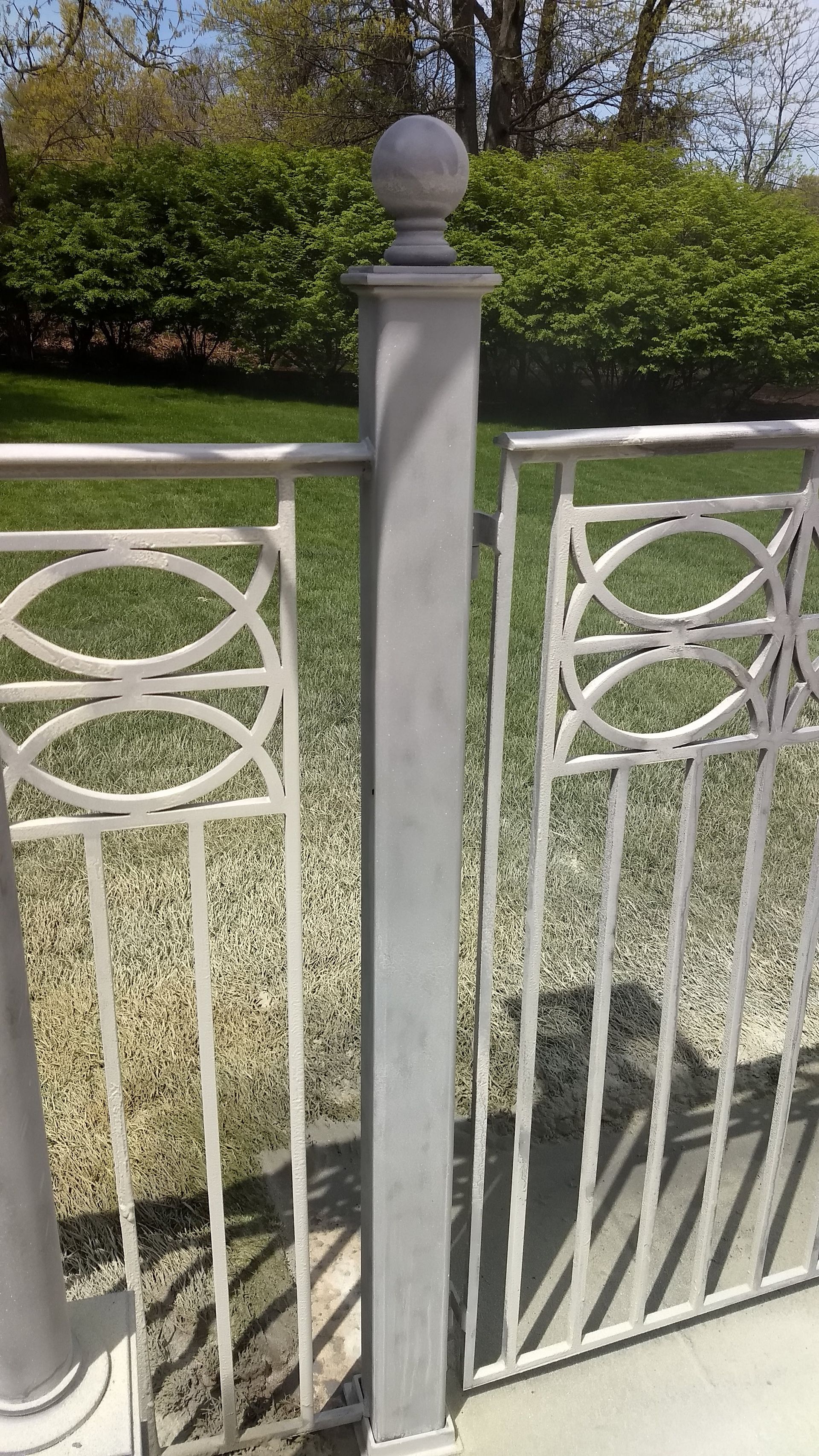 After paint stripping steel fence in Paoli Pa