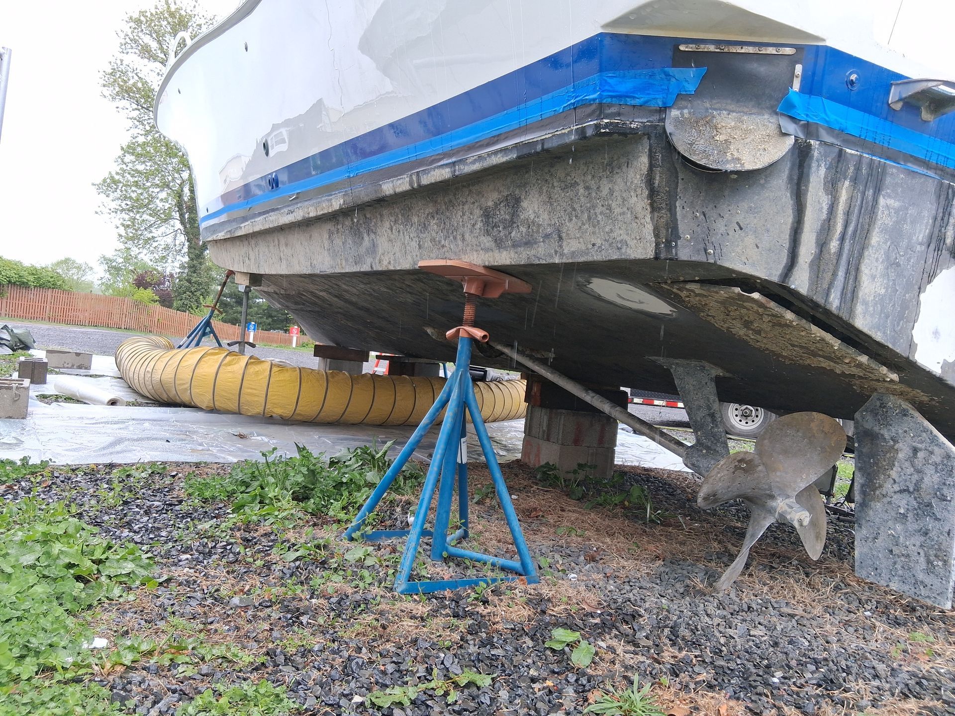 Before bottom paint removal from boat in Philadelphia Pa