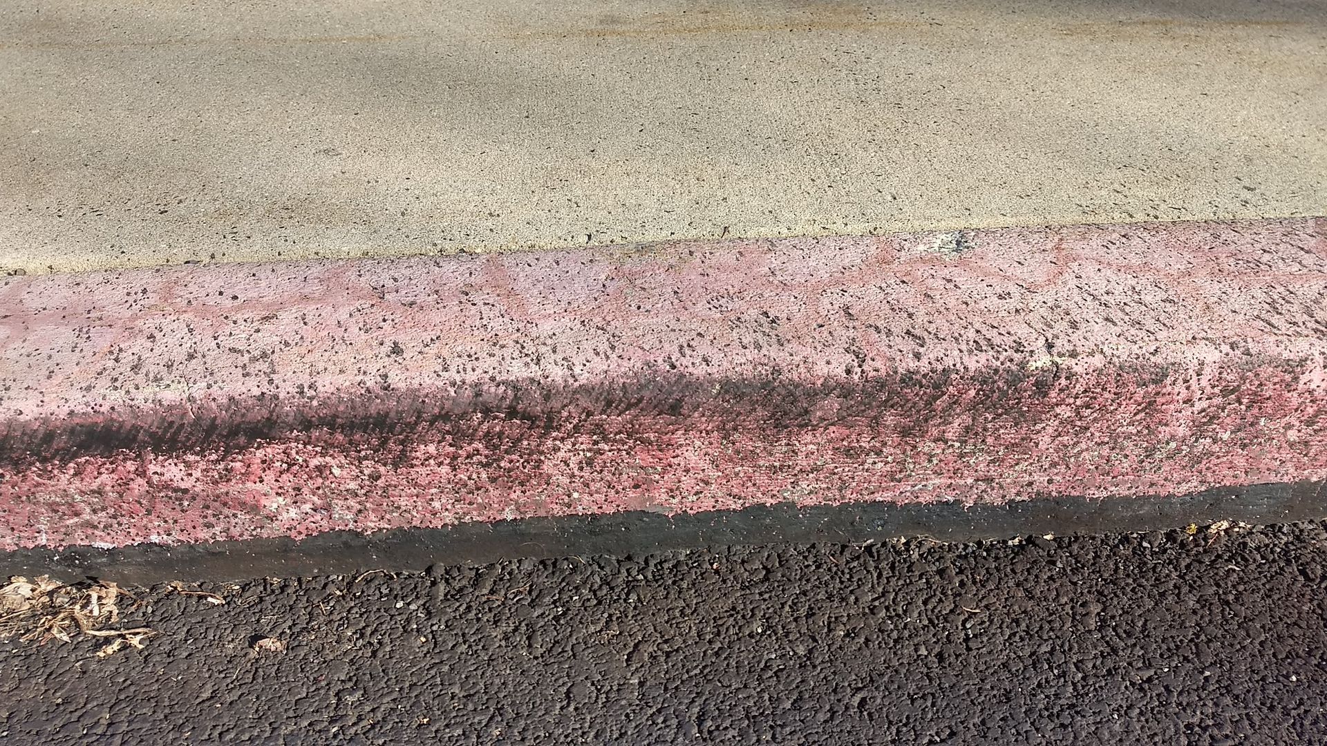 Before curb paint removal in New Hope Pa