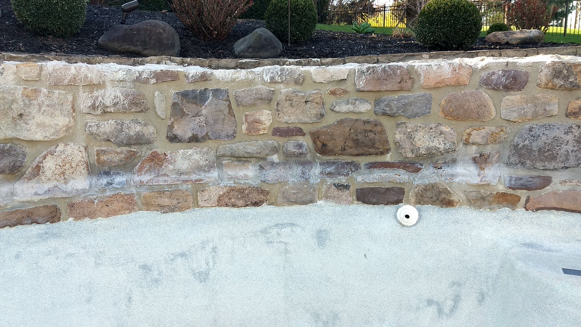 Before pool stone calcium removal in Newtown Pa