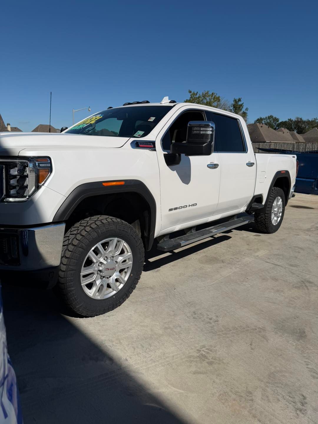 White Pickup Truck Parked Outside | Zim's Tire and Auto