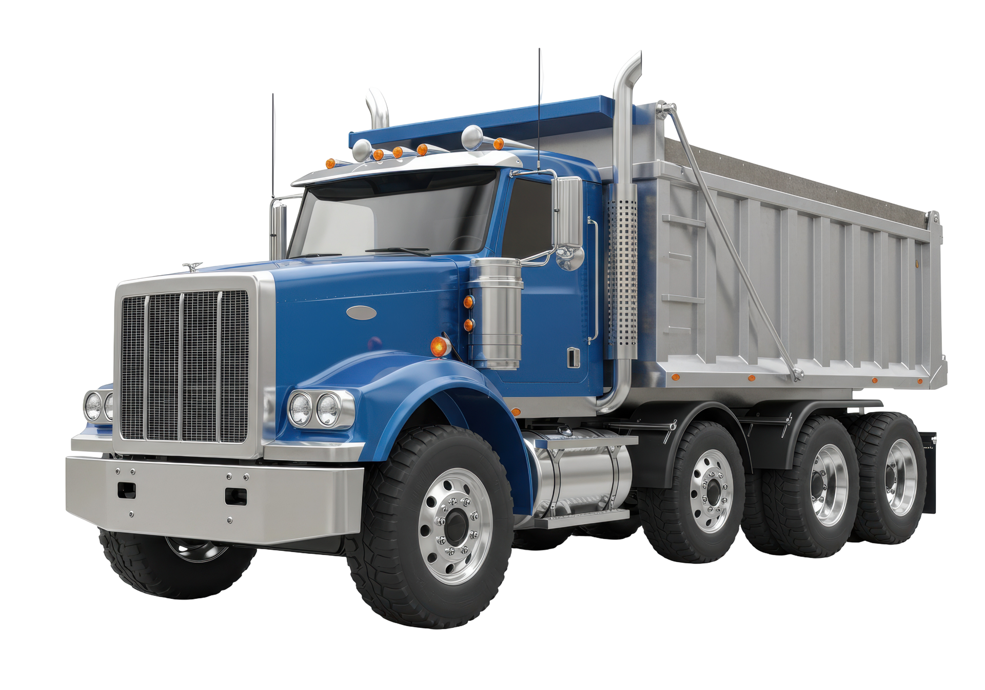 Dump truck unloading gravel on a dirt road beside green trees